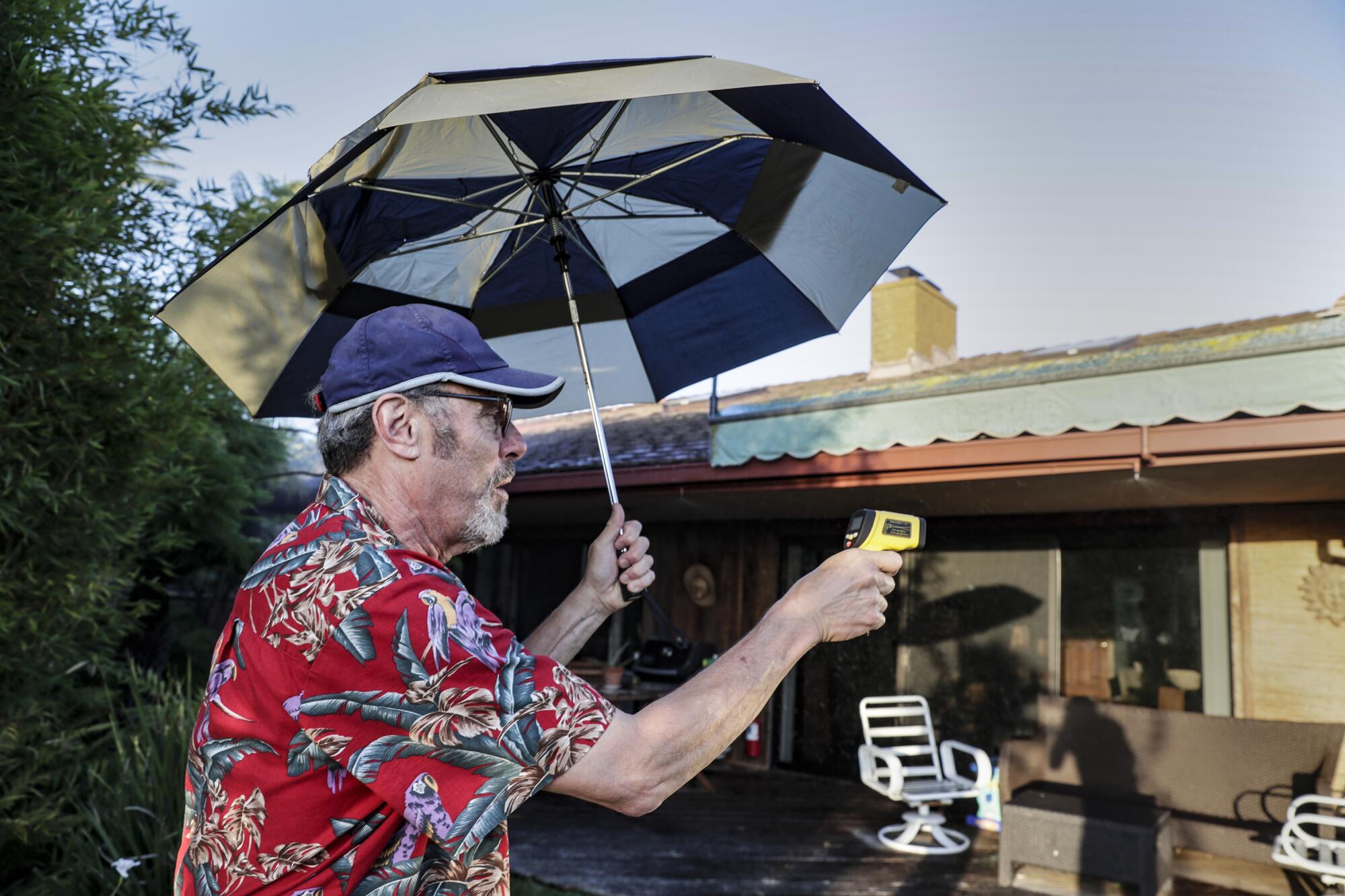 Steve Yusi monitors the temperature of his house.