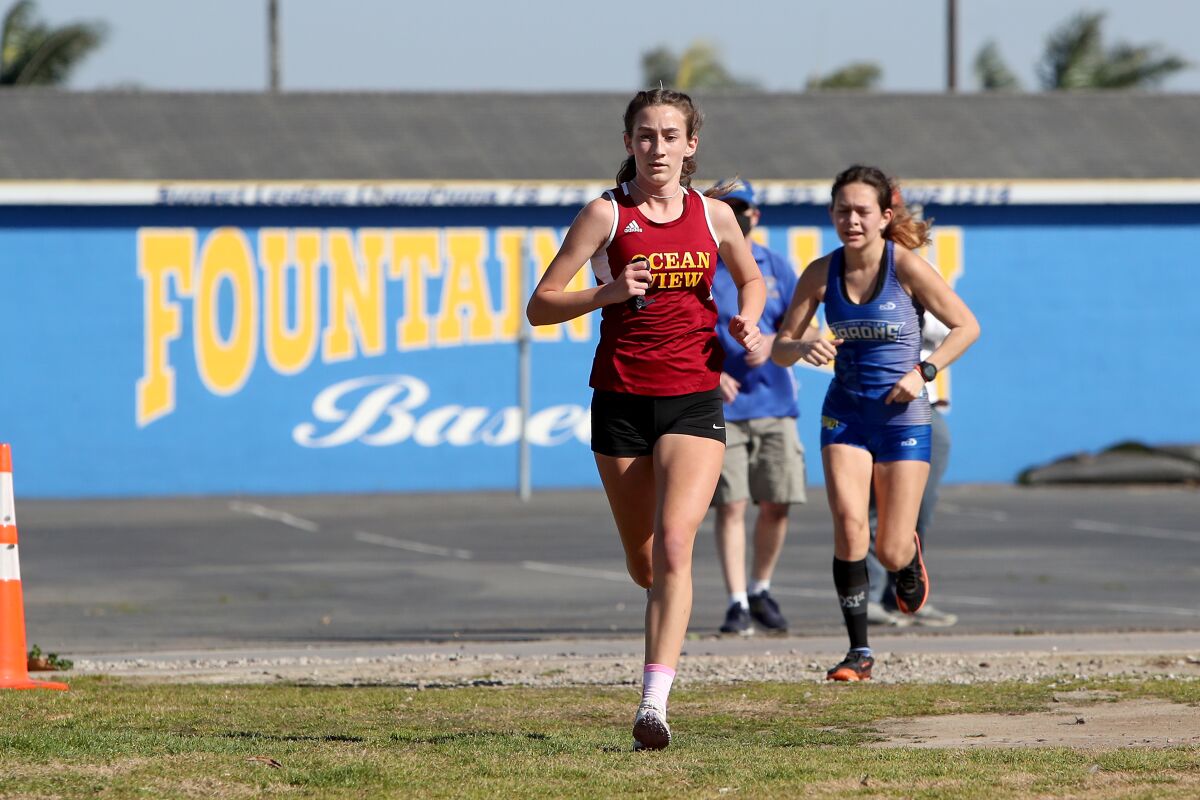 Ocean View's Elizabeth King competes against Fountain Valley's Samantha Martinez in a dual meet on Feb. 20.