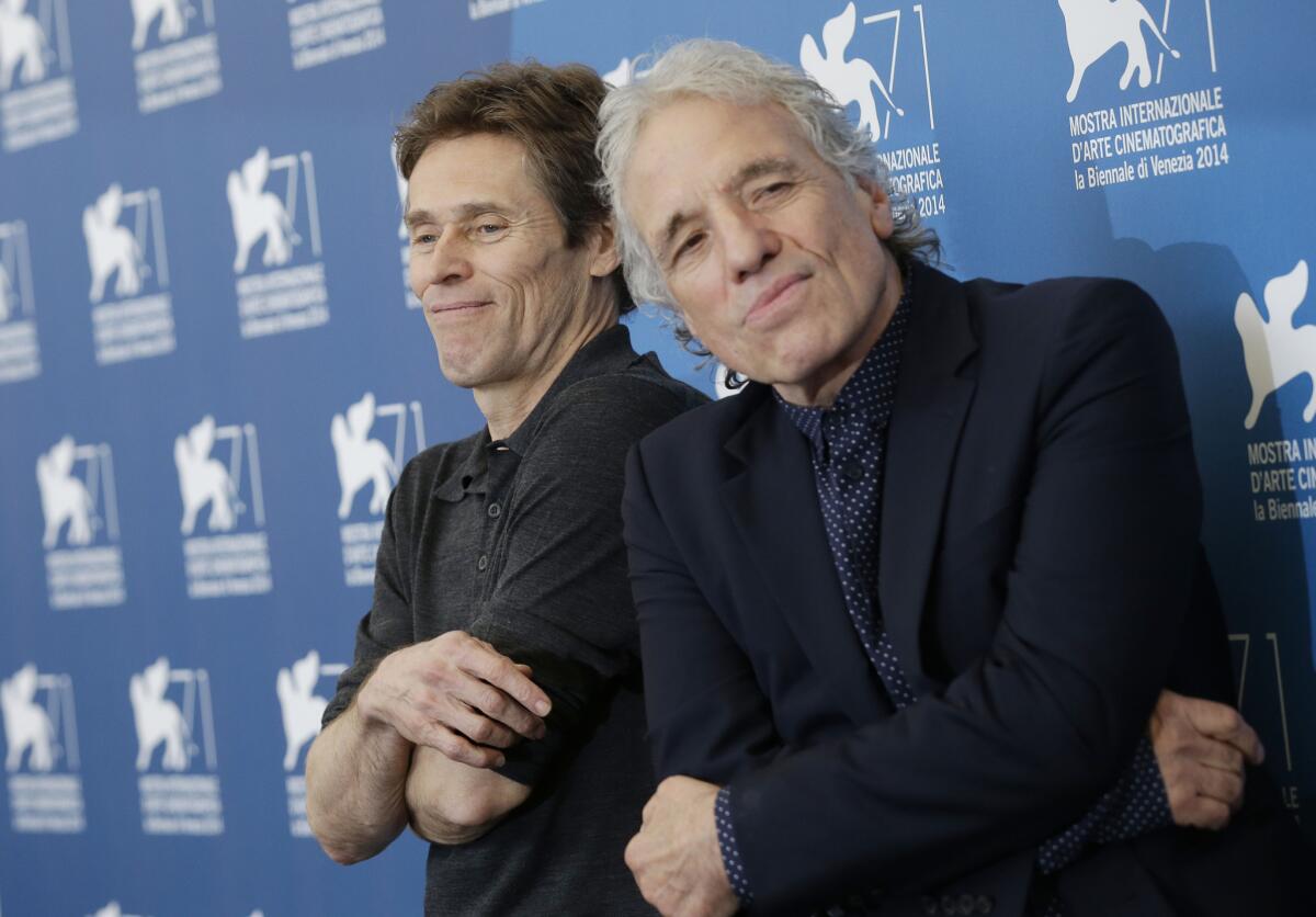El director Abel Ferrara, a la derecha, y el actor Willem Dafoe en el Festival de Venecia del 2014.
