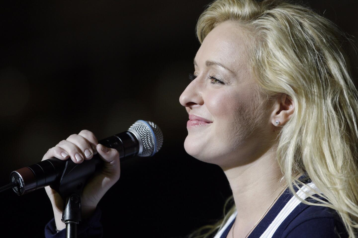 Country singer Mindy McCready performs in Nashville in this undated photo. McCready, who hit the top of the country charts before personal problems sidetracked her career, died Sunday. She was 37.