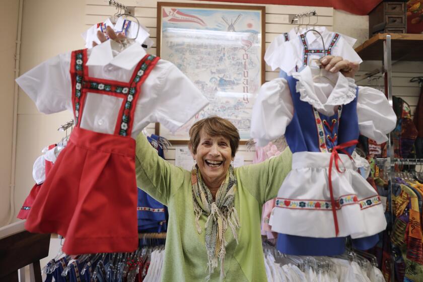 SOLVANG, CA -- AUGUST 20, 2019: Sue Manning, owner of Elna’s Dress Shop in Solvang, thinks President Trump’s idea of buying Greenland is silly and is just a distraction from everything else going on. She said Greenland would be a good market for wool though. (Myung J. Chun / Los Angeles Times)