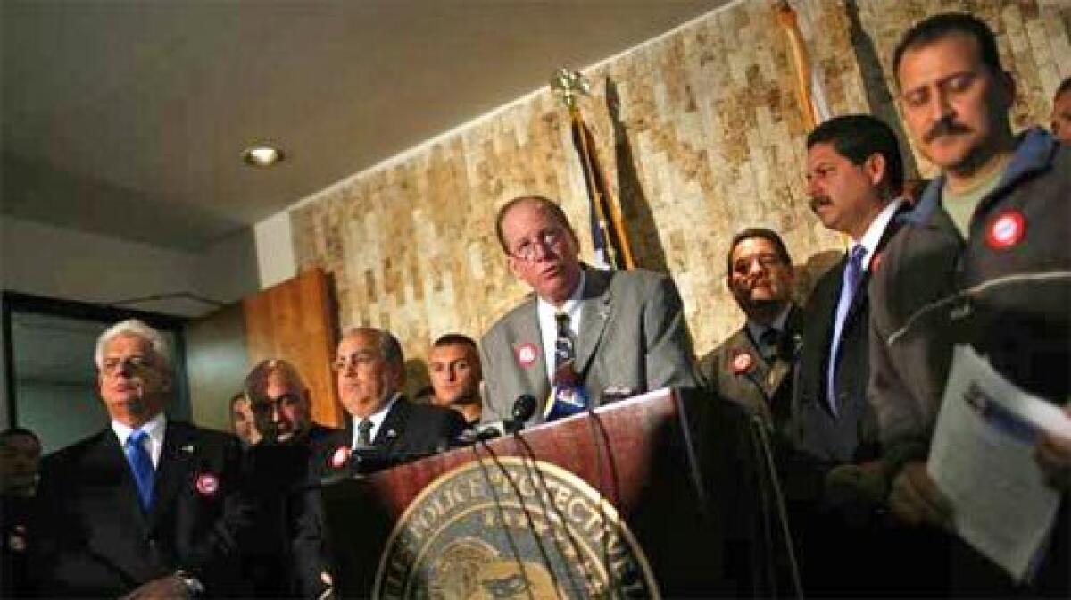 DISPLEASED: Timothy Sands, president of the Los Angeles Police Protective League, speaks at a press conference announcing the groups displeasure with financial disclosure requirements that are about to be implemented by the LAPD.