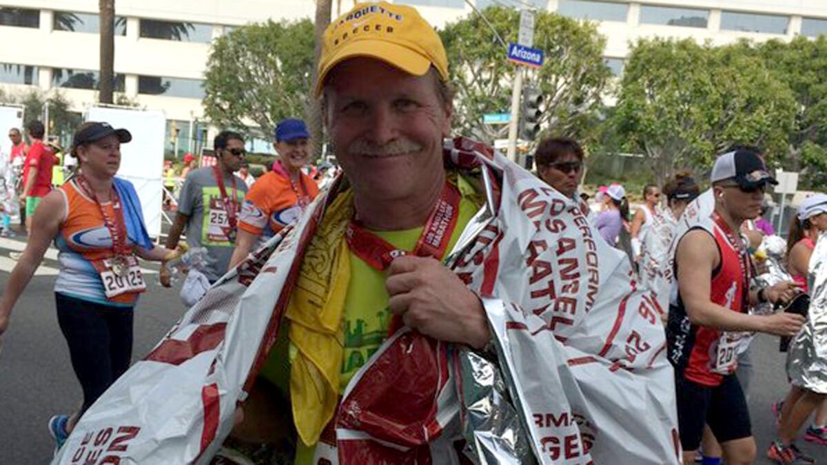 L.A. Times columnist Chris Erskine begins the recovery process after completing the L.A. Marathon on Sunday.