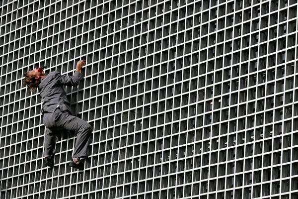 Frenchman Antoine le Menestrel climbs a building in Brasilia, Brazil, as part of the events marking the Year of France in the South American country.