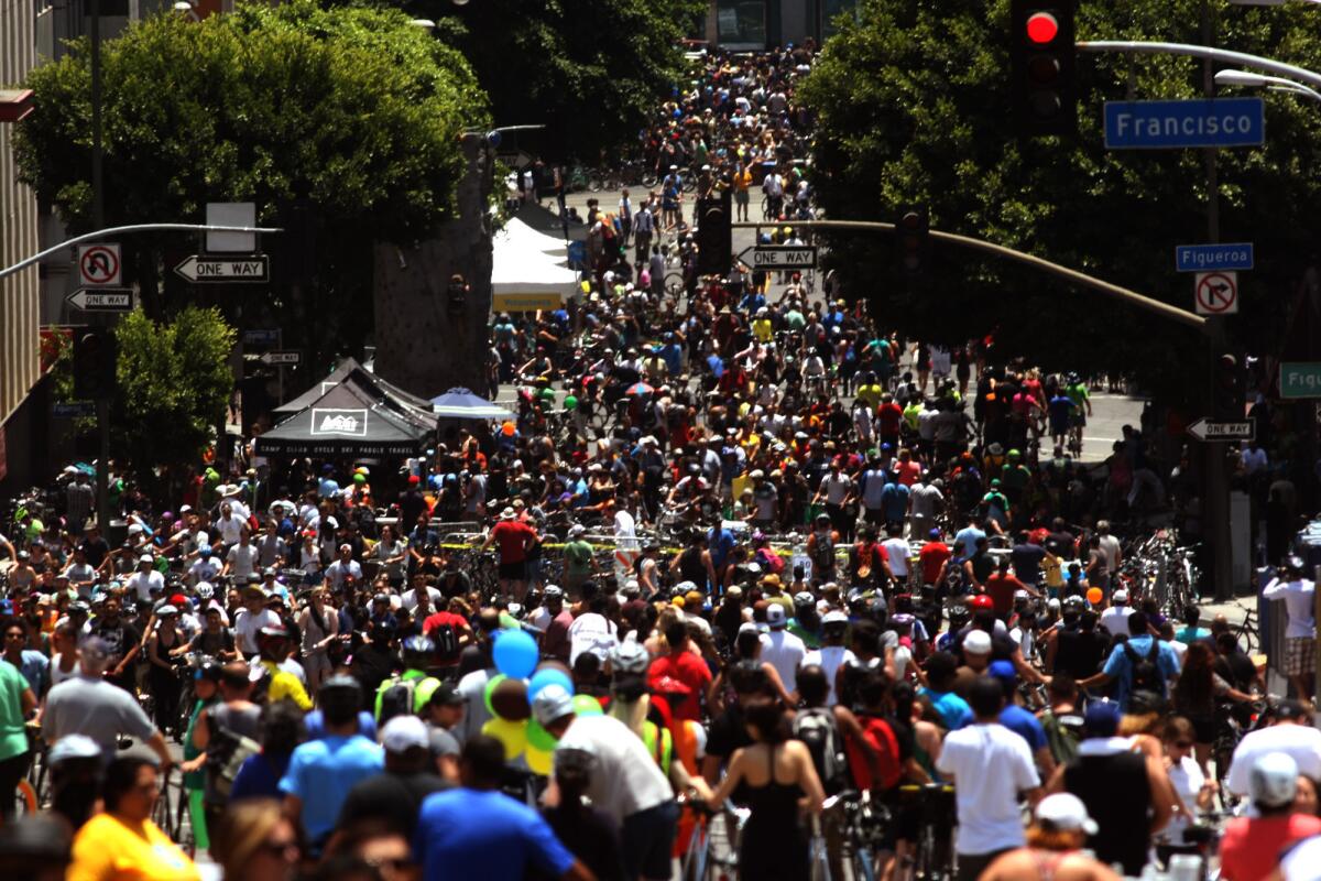 Hundreds of cyclists crowd the disembark and walk zone during last year's CicLAvia in Los Angeles. L.A. County is now the populous county in the country.