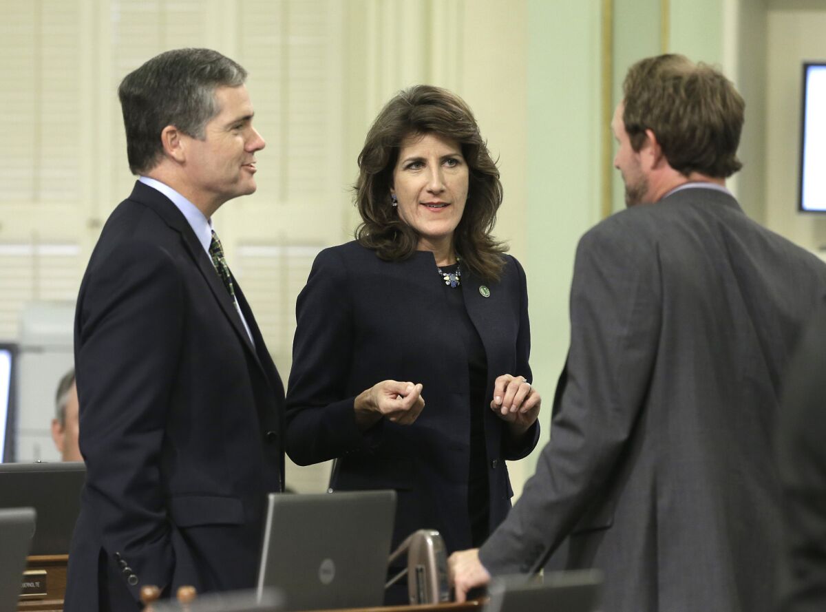 Assemblywoman Catharine Baker (R-San Ramon), center, authored the bill to help keep domestic violence survivors' addresses confidential.
