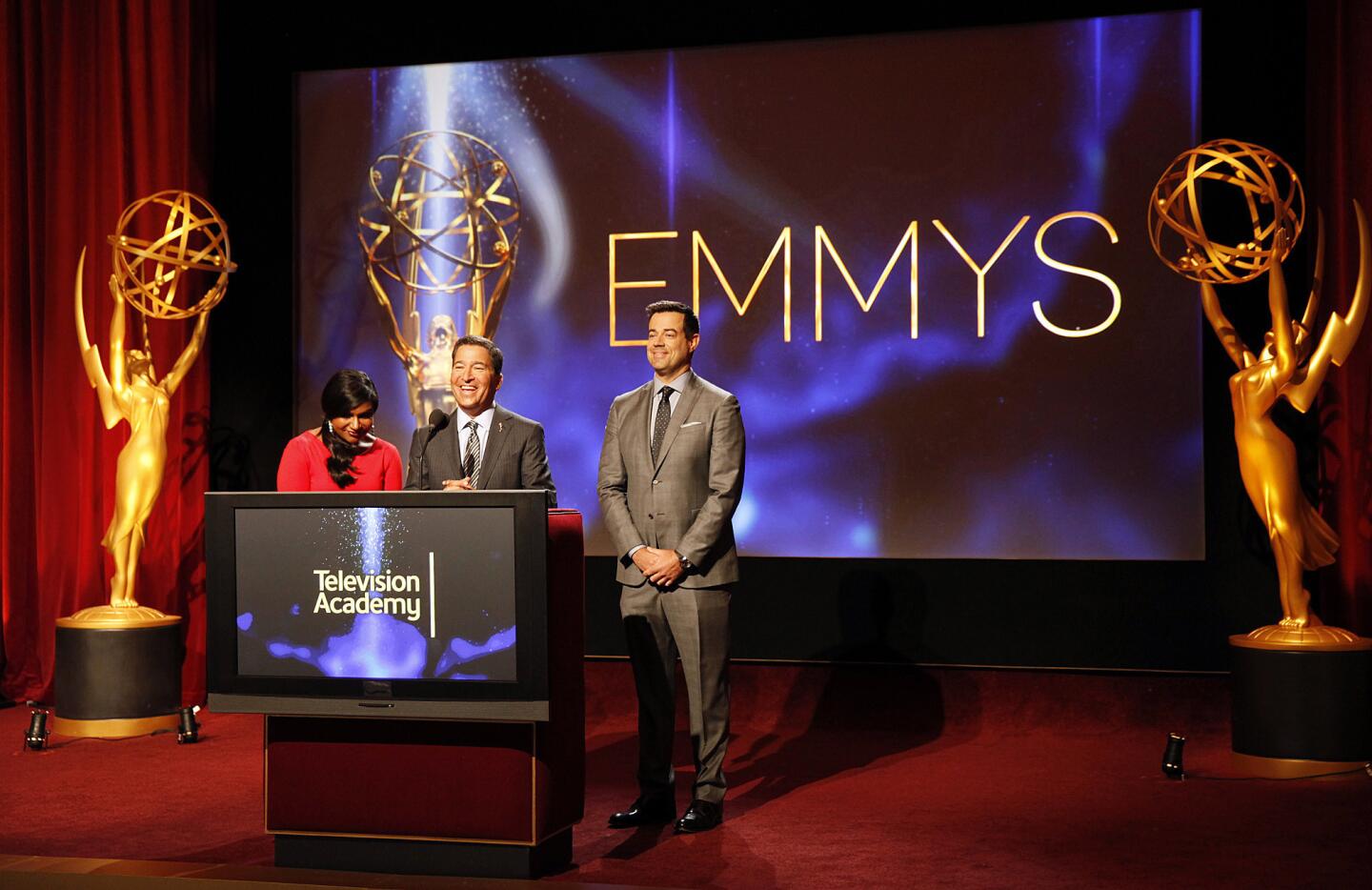 Carson Daly, right, and Mindy Kaling, left, join Television Academy Chairman and CEO Bruce Rosenblum to announce the 66th Primetime Emmy Awards nominations in the Television Academy's Leonard H. Goldenson Theatre in North Hollywood.