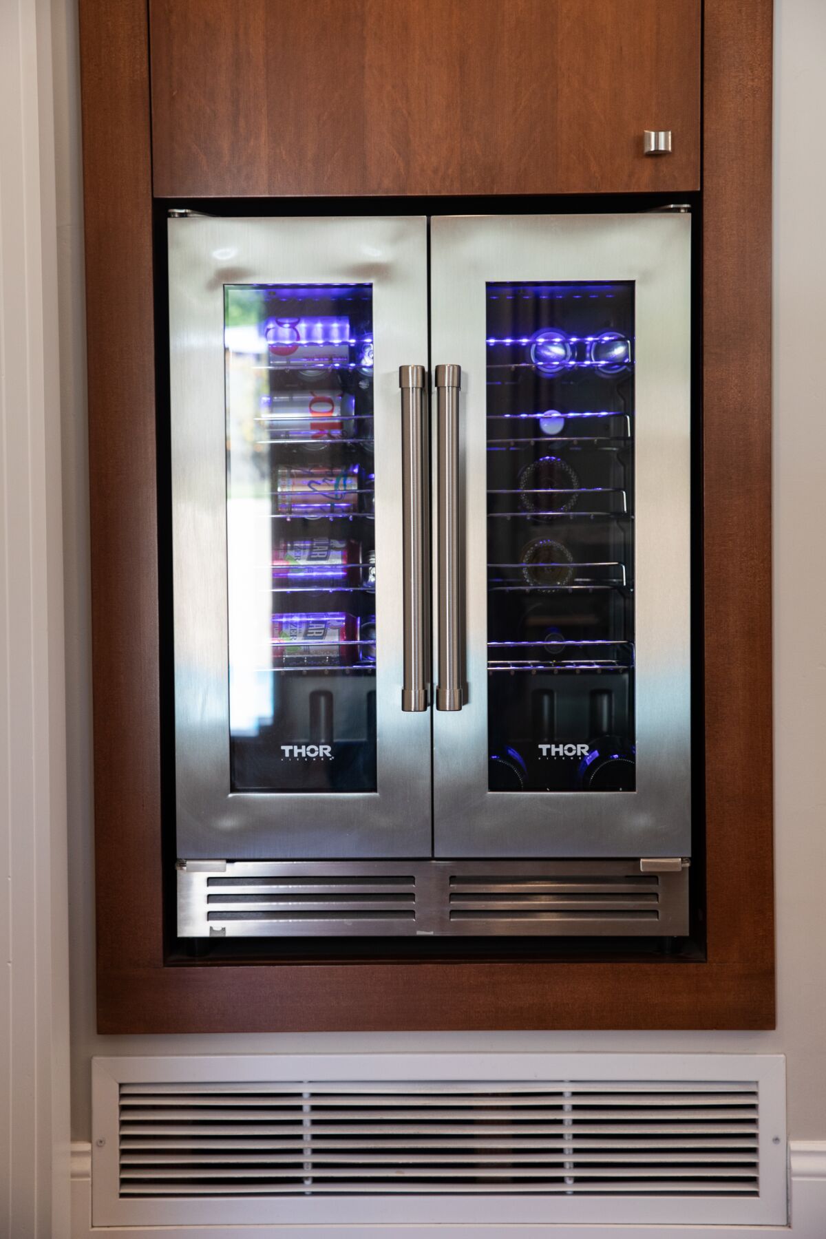 A wine refrigerator in the remodeled kitchen of Rebecca Zoni-McMakin's home.