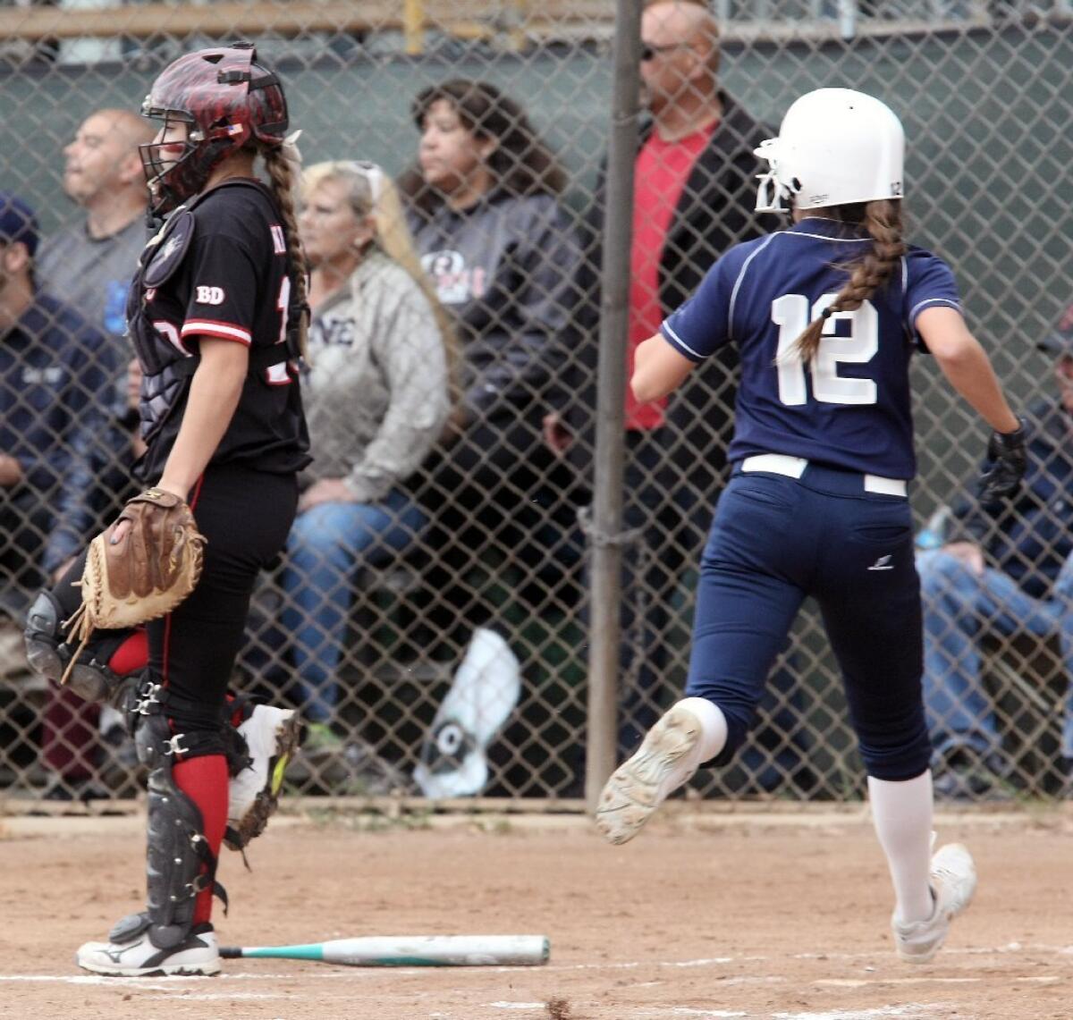 Alyssa Hernandez, right, and the Crescenta Valley softball team rallied past Glendale, 8-5, on Thursday.