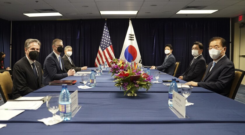 U.S. Secretary of State Antony Blinken meets with South Korean Foreign Minister Chung Eui-yong in Honolulu, Hawaii Saturday, Feb. 12, 2022. (Kevin Lamarque/Pool Photo via AP)