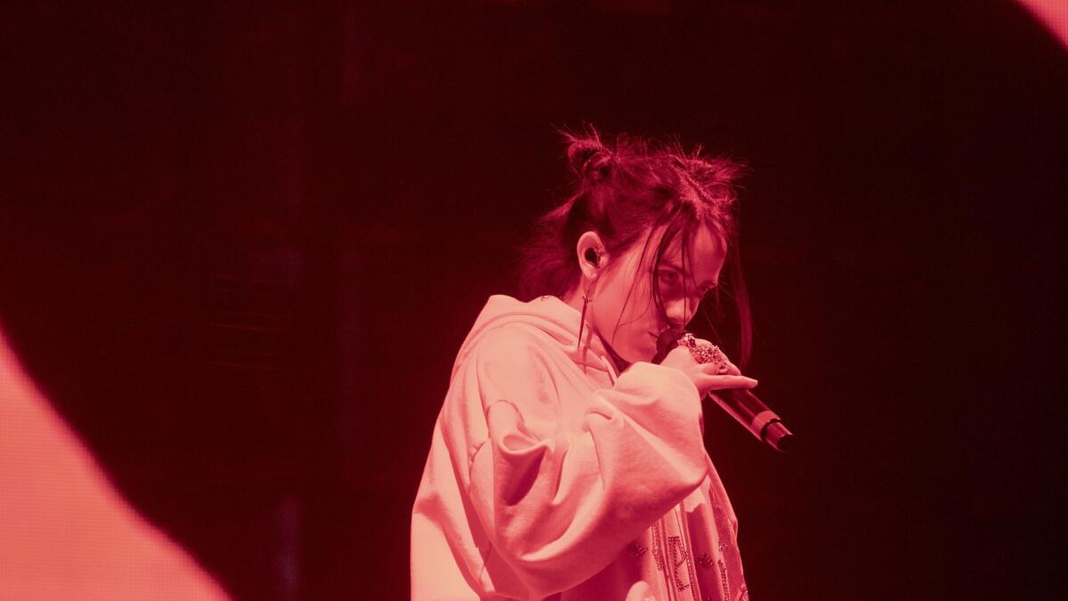 Billie Eilish on stage at Coachella in April. Her music is among the most streamed of the year so far, according to Nielsen's mid-year report.