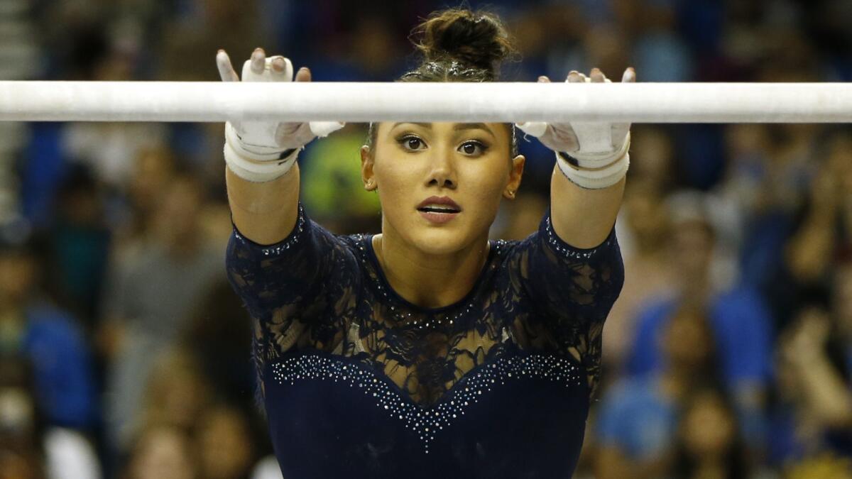 UCLA's Kyla Ross competes on uneven bars during a Pac-12 meet on Jan. 21, 2019.