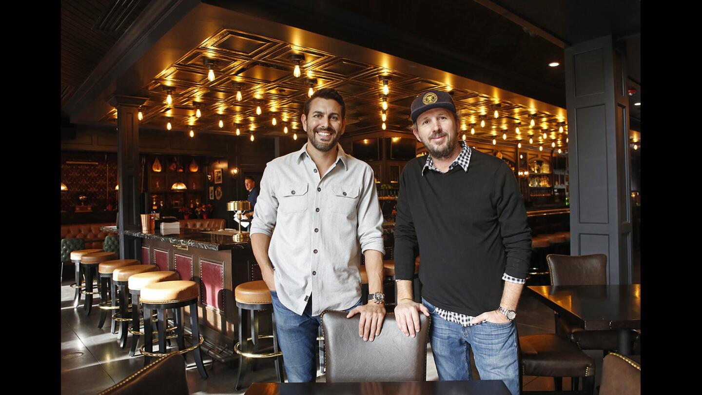 Co-owners Andrew Gabriel, left, and Mario Marovic have opened The Country Club, a new restaurant and bar on 17th Street in Costa Mesa.