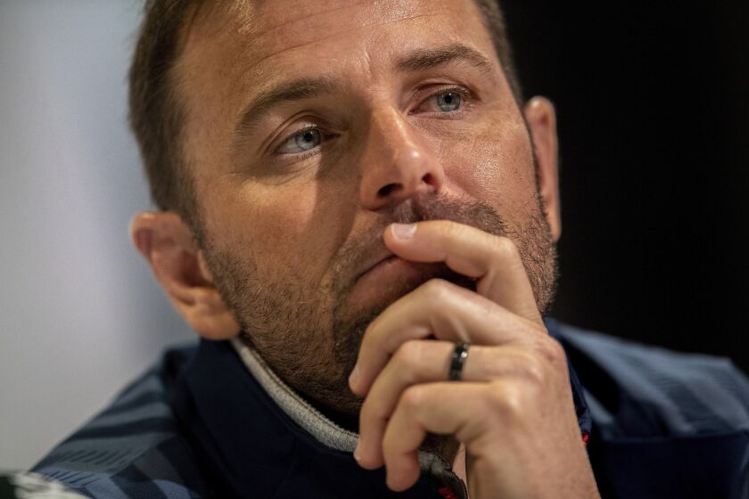 FILE - U.S. Davis Cup captain Mardy Fish attends a press conference in Madrid, Spain, Sunday, Nov. 17, 2019. U.S. Davis Cup team coaches Mardy Fish and Bob Bryan were fined $10,000 apiece and handed bans of four months after promoting a gambling operator via social media. The London-based International Tennis Integrity Agency (ITIA) announced the punishments Tuesday, Nov. 29, 2022, saying that Fish and Bryan cooperated fully with its investigation and removed the problematic posts immediately. (AP Photo/Bernat Armangue, File)