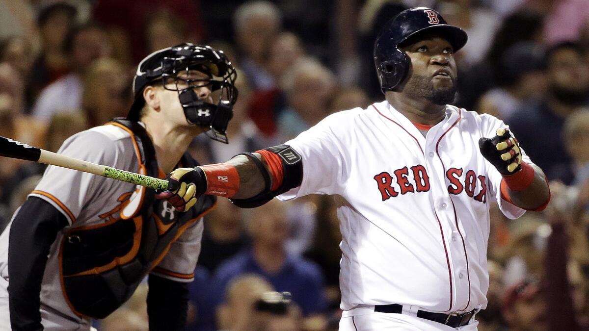 Red Sox slugger David Ortiz watches his solo home run against the Orioles in the sixth inning Monday.
