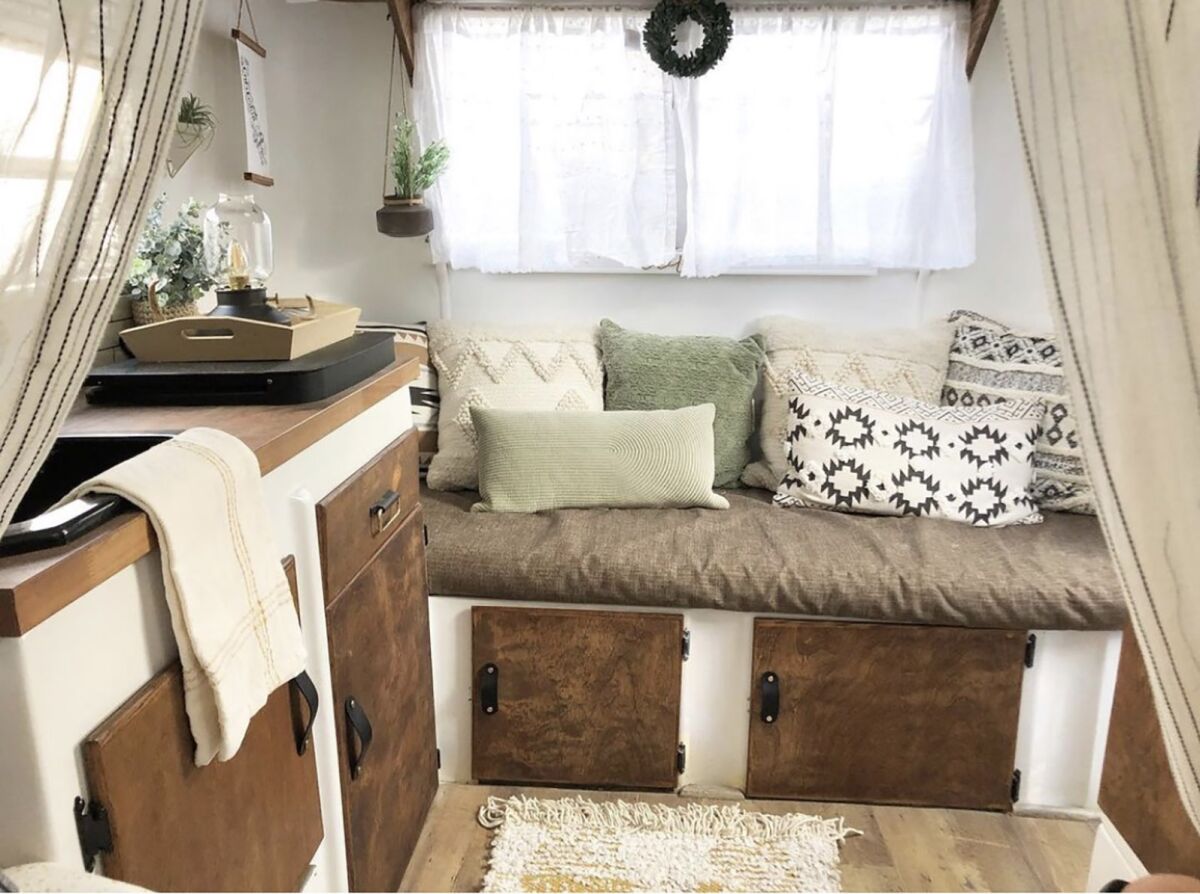 Breezy style meshes with comfortable touches in this trailer from Wanderlust Vintage Trailers.