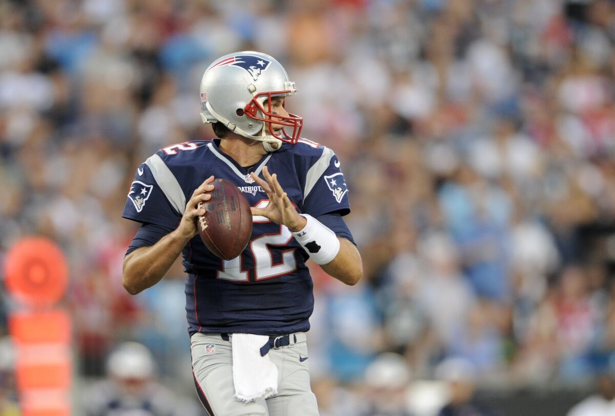 Quarterback Tom Brady and the Patriots are a 13 1/2-point favorite over the Rams this week.