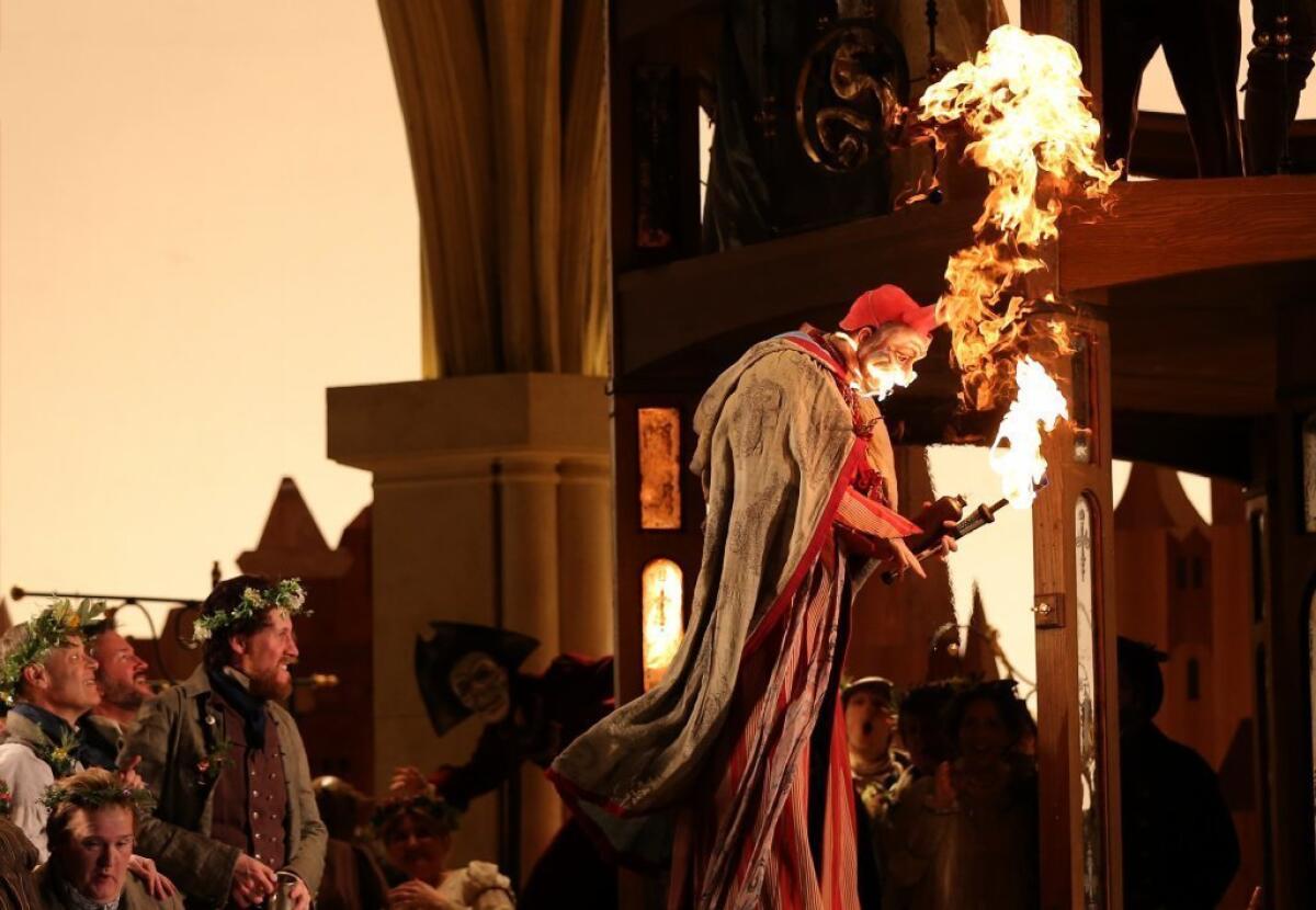 Actor Wesley Daniel's mask catches fire during a Lyric Opera of Chicago dress rehearsal for "Die Meistersinger von Nurnberg."