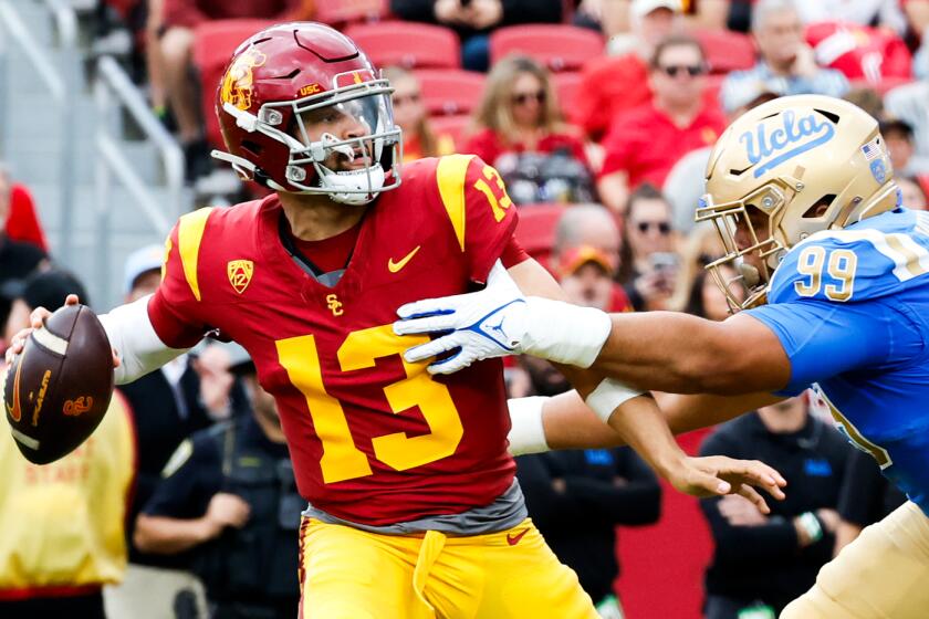 LOS ANGELES, CA - NOVEMBER 18: USC Trojans quarterback Caleb Williams (13) looks to pass.