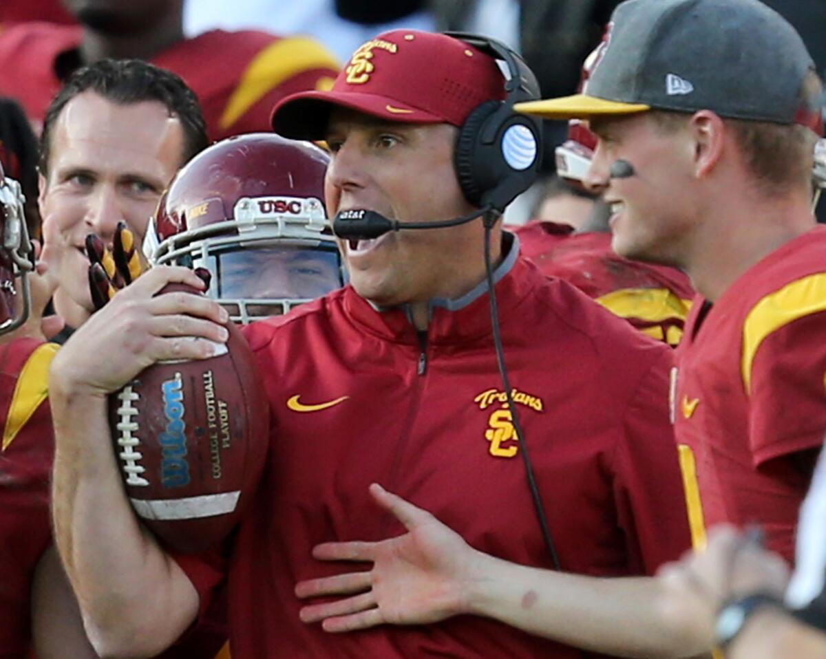 USC Coach Clay Helton reacts after an interception by the Trojans against UCLA at the Coliseum on Nov. 28.