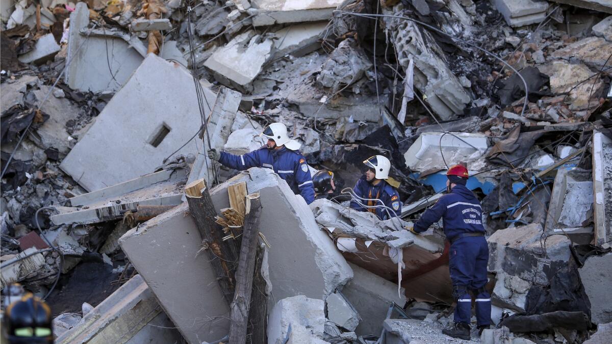 Rescuers work at the scene of a collapsed apartment building in Magnitogorsk, a city of 400,000 people about 870 miles southeast of Moscow.