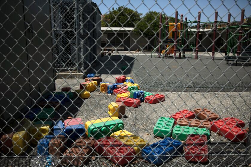 Building block toys are scattered in the playground of an elementary school in Los Angeles in 2020. Photo by Jae C. Hong, AP Photo