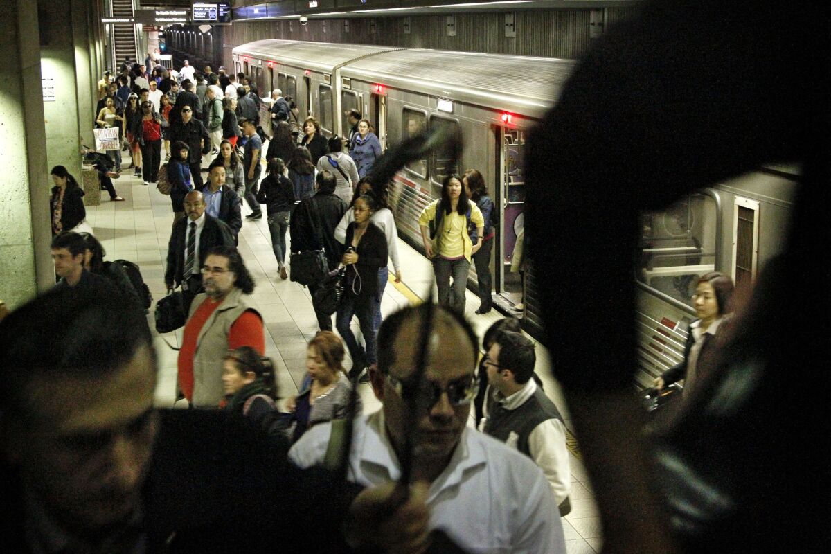 California's population totaled more than 38.2 million in July, up 0.9% from July 2012, the state estimates. Above, passengers get off a Red Line train at Union Station in downtown Los Angeles.
