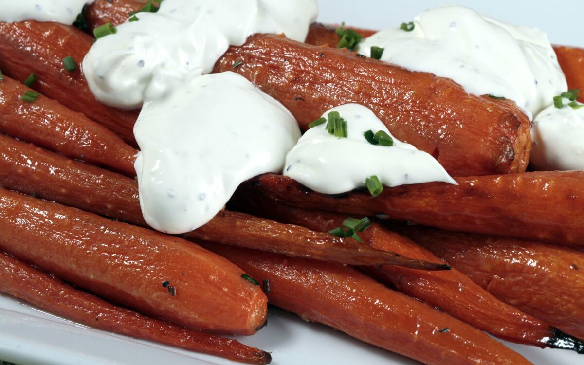 Connie and Ted’s roasted carrots with rosemary butter and black pepper crème fraîche