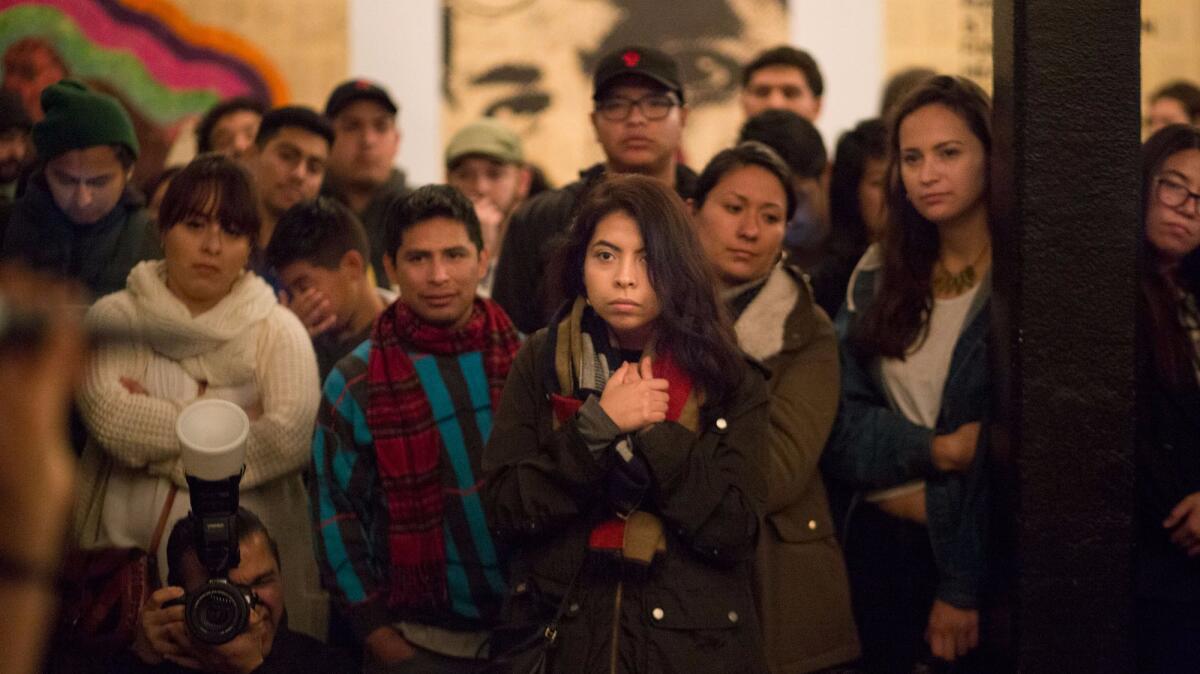 People listen to poetry at the Boyle Heights Arts Conservatory.
