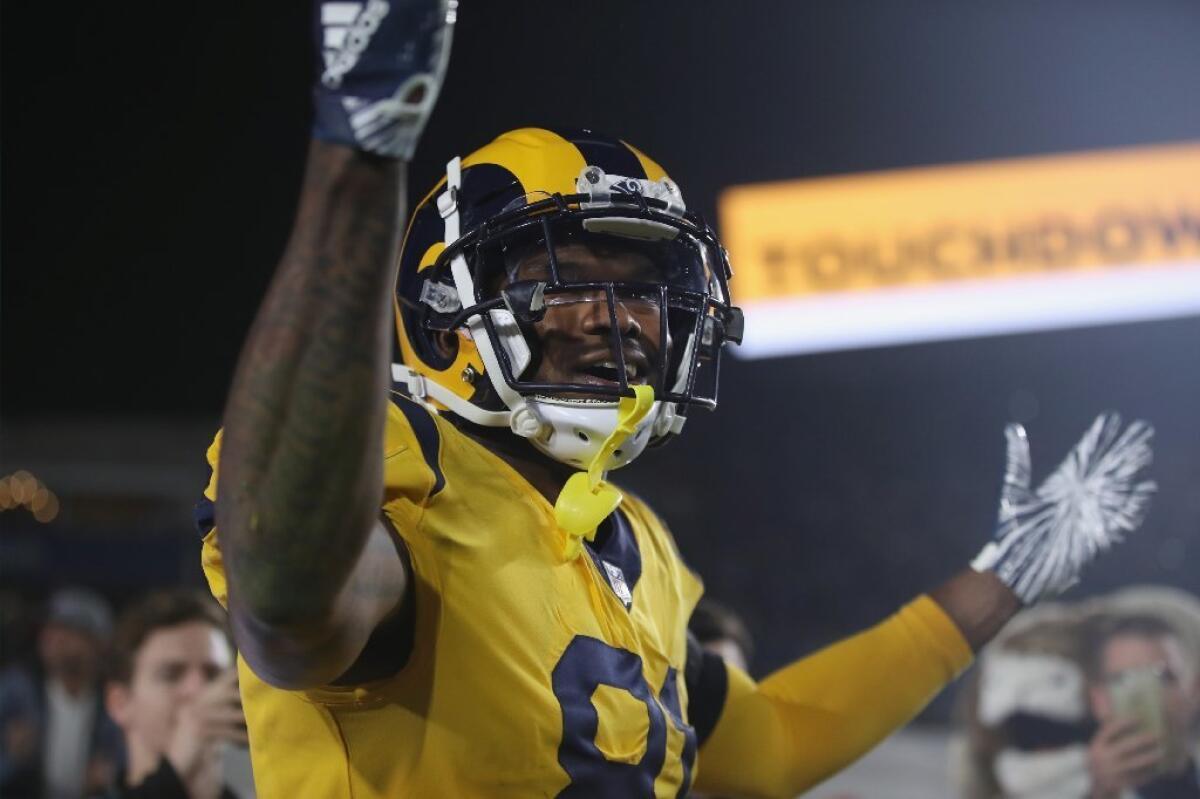 Rams tight end Gerald Everett (81) celebrates his go-ahead touchdown during the fourth quarter on Nov. 19.