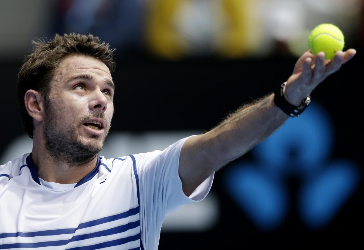 Stan Wawrinka of Switzerland serves to Marsel Ilhan of Turkey during their first round match at the Australian Open in Melbourne, Australia. Wawrinka defeated Ilhan, 6-1, 6-4, 6-2.