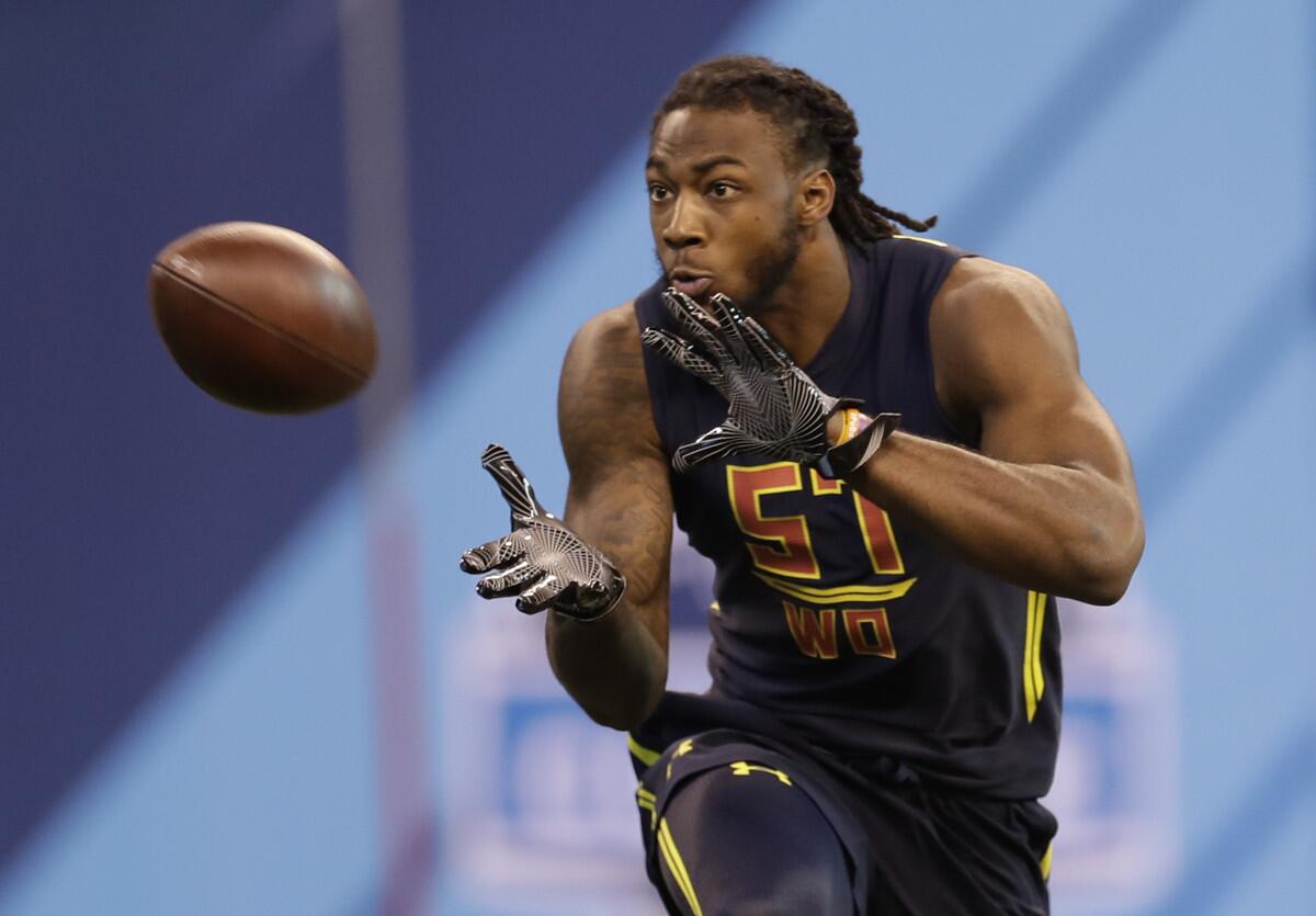 Clemson wide receiver Mike Williams runs a drill at the NFL football scouting combine.