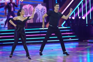 Cody Rigsby and his partner Cheryl Burke perform a number from "Grease" on "Dancing With the Stars."