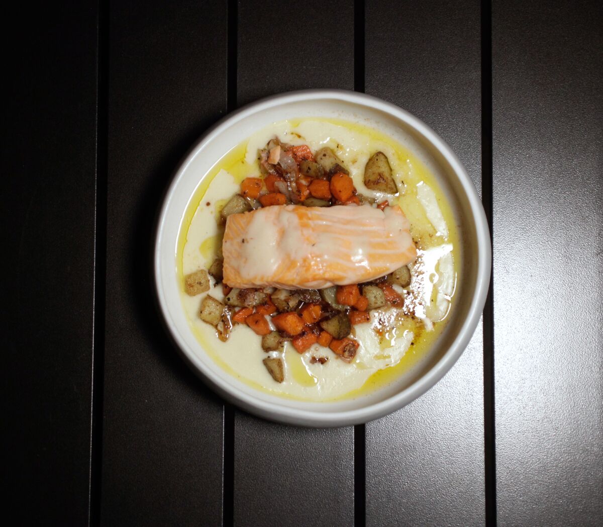 A photo of salmon dinner from Luca at The Guild Hotel