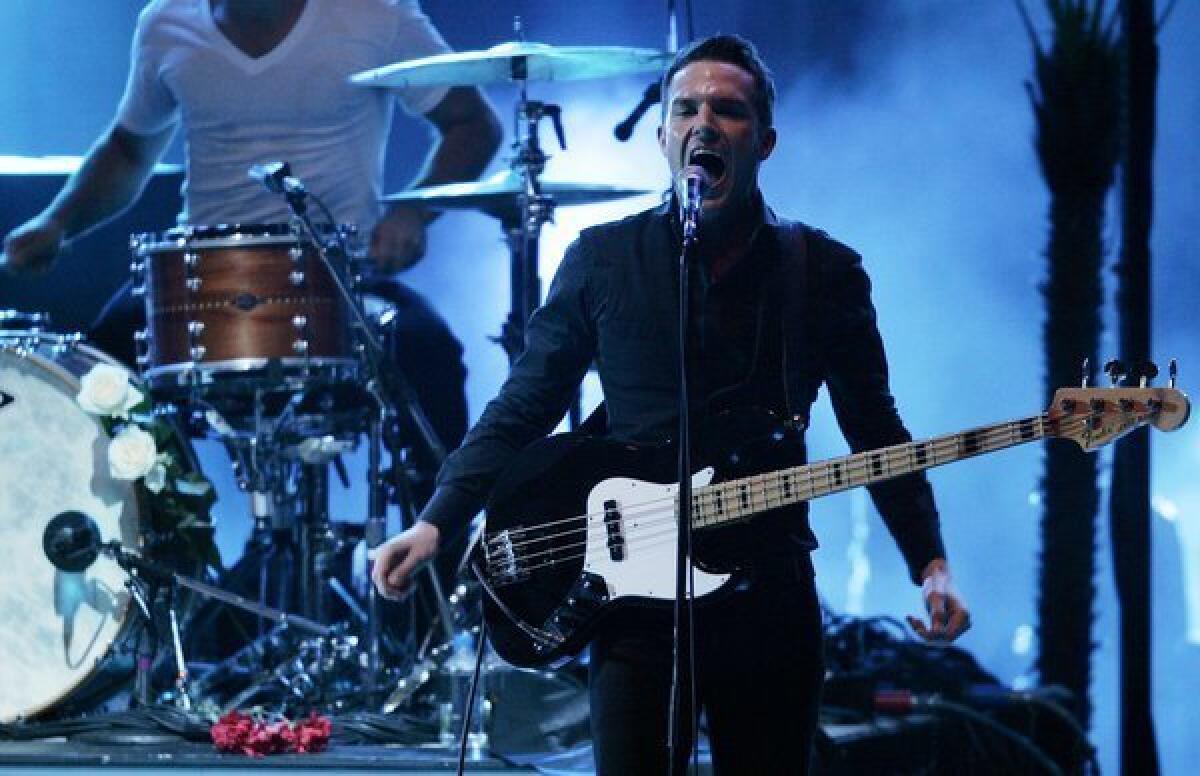 The Killers, here performing at the Hollywood Bowl in 2009, have released a video for the song "Here With Me" that was directed by Tim Burton.