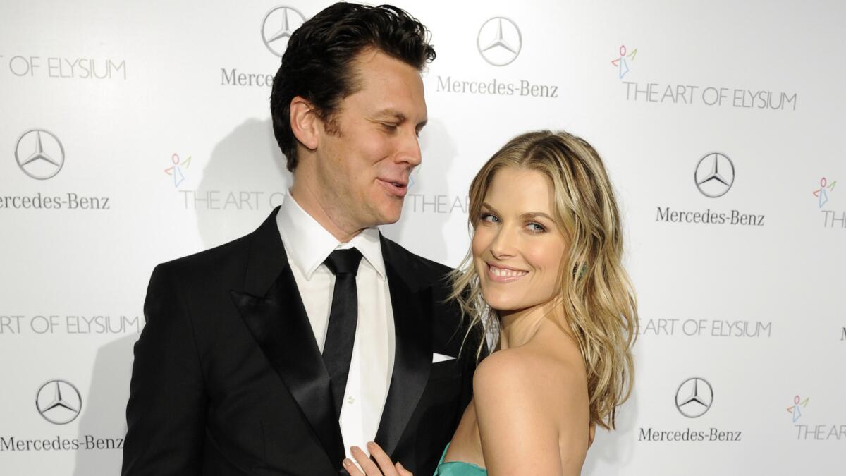 Actress Ali Larter and husband Hayes MacArthur pose at the Art of Elysium's Heaven Gala on Jan. 11, 2014, in Los Angeles.