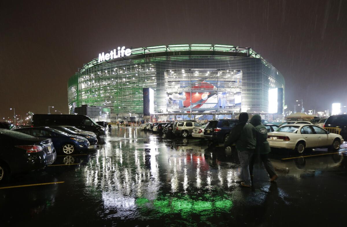 A steady rain falls on MetLife Stadium in East Rutherford, N.J., on Dec. 1.