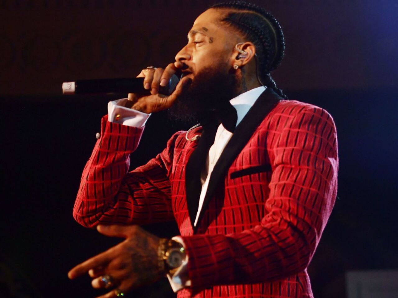 Grammy-nominated rapper Nipsey Hussle was gunned down outside his Marathon Clothing store in the same South L.A. neighborhood where he was known as much for his civic work as he was for his hip-hop music. He was 33.