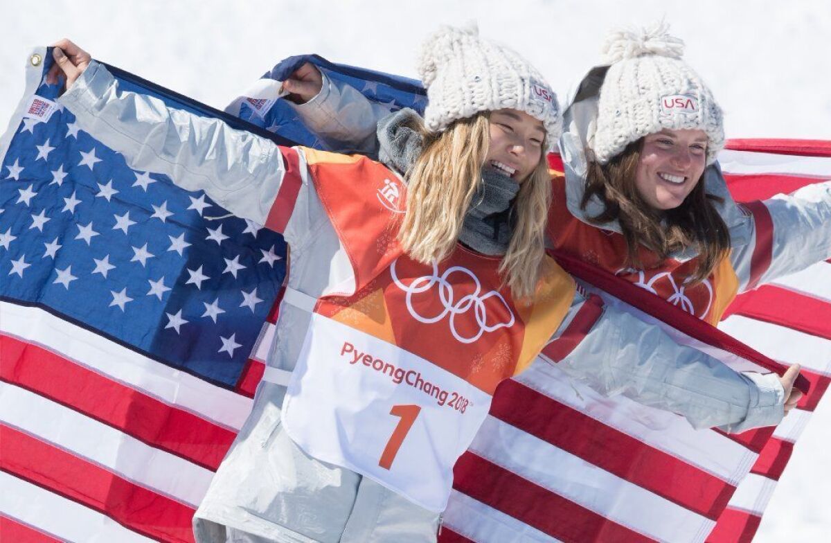 U.S.' Chloe Kim and Arielle Gold celebrate after placing first and third in the women's snowboard halfpipe finals in 2018.