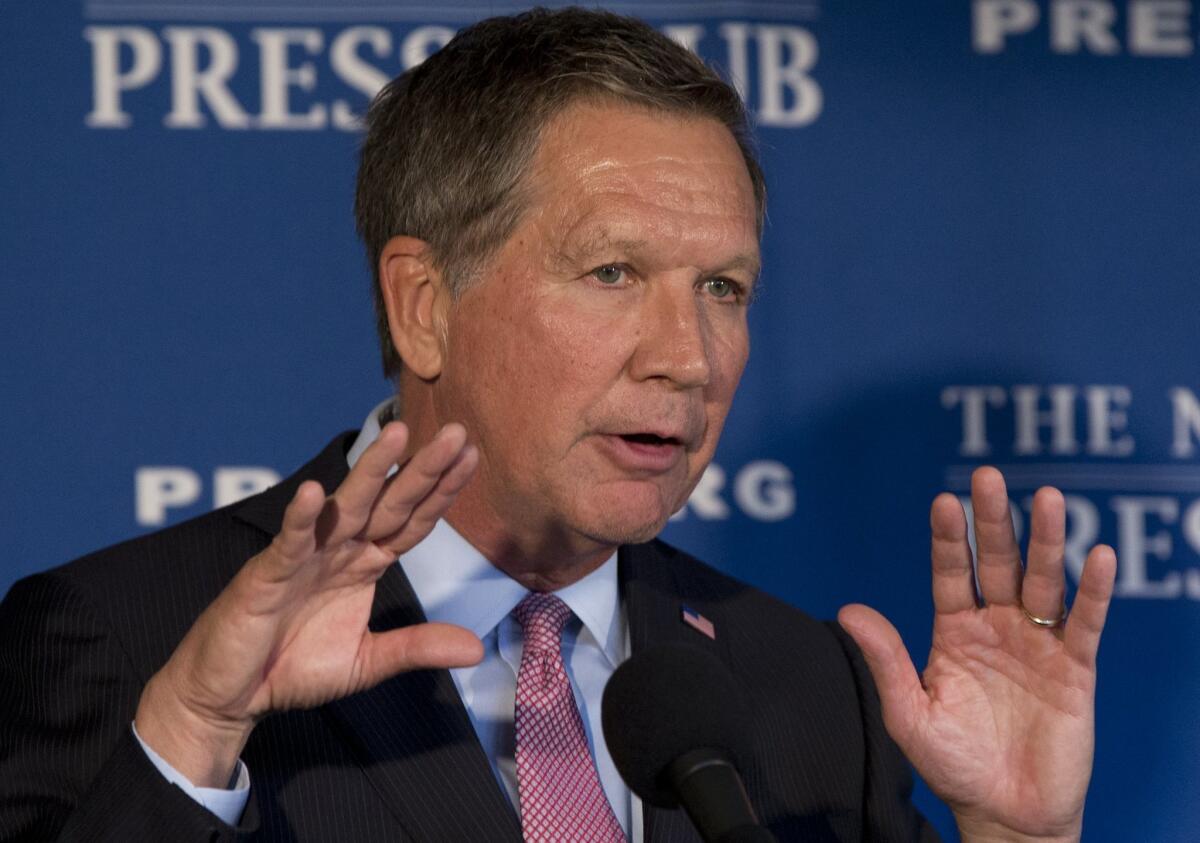 Republican presidential candidate, Ohio Gov. John Kasich speaks at the National Press Club in Washington, Tuesday, Nov. 17, 2015, about national security and other topics. (AP Photo/Carolyn Kaster)
