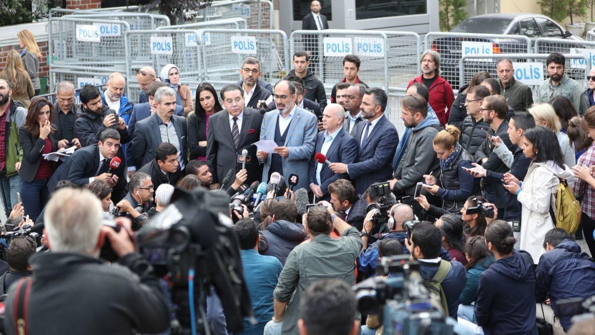 Turan Kislakci, center, the head of the Turkish-Arab Media Association, and other members of the organization, call for a full investigation into the death of Jamal Khashoggi, in front of the Saudi Arabian consulate in Istanbul, Turkey, on Saturday.