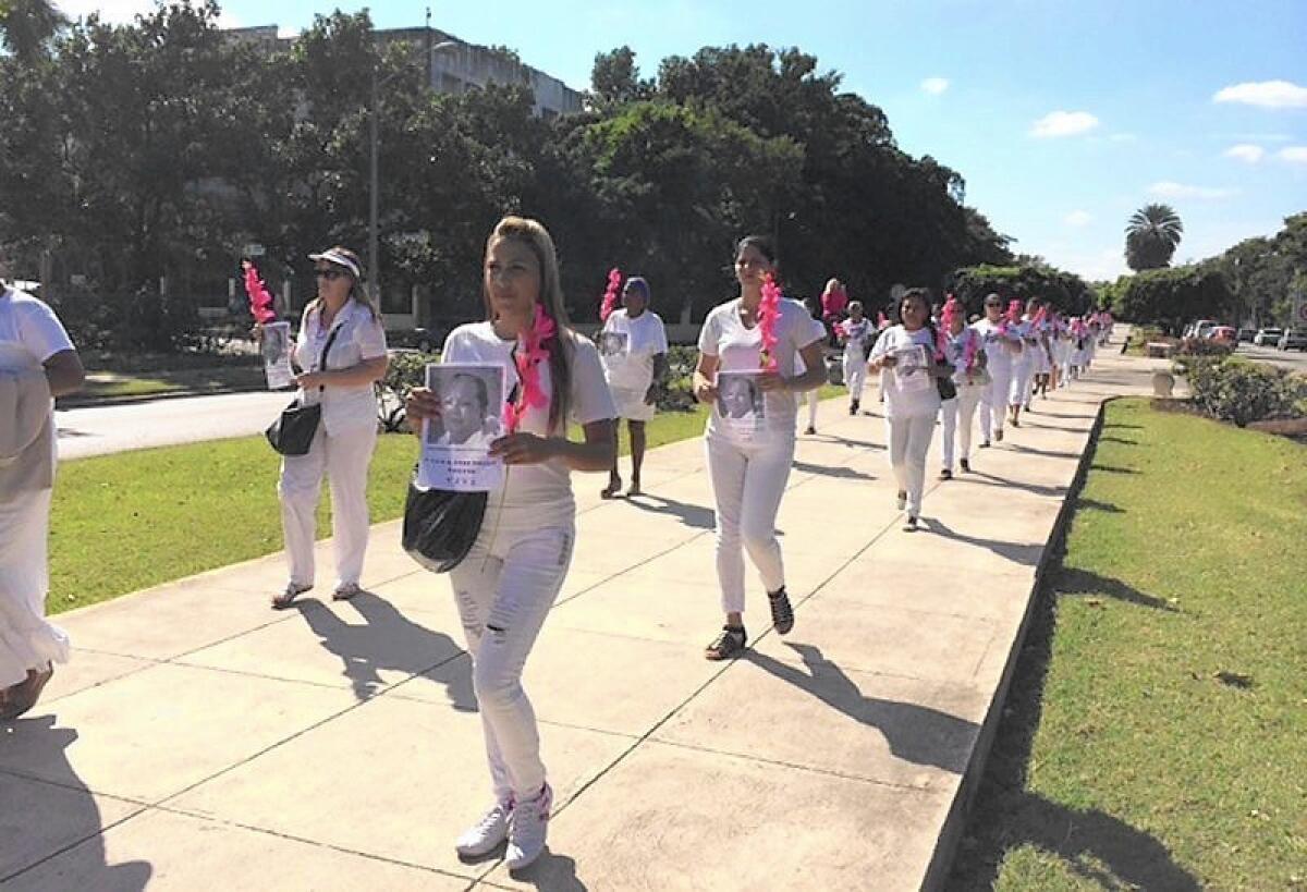 Ladies in White demand the release of political prisoners as they march in Havana on Dec. 21.