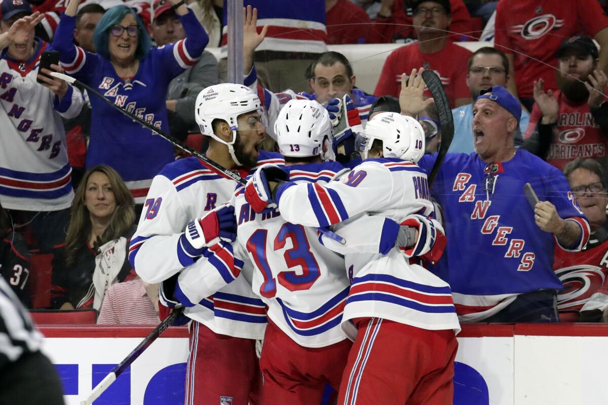 Artemi Panarin scores in overtime, Rangers beat Hurricanes 3-2 to take 3-0  series lead - The San Diego Union-Tribune