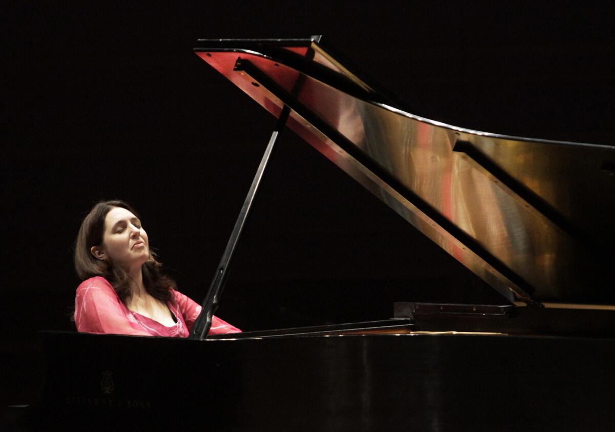 Pianist Simone Dinnerstein and chamber ensemble A Far Cry will perform a new work by Philip Glass at Soka Performing Arts Center on Friday.