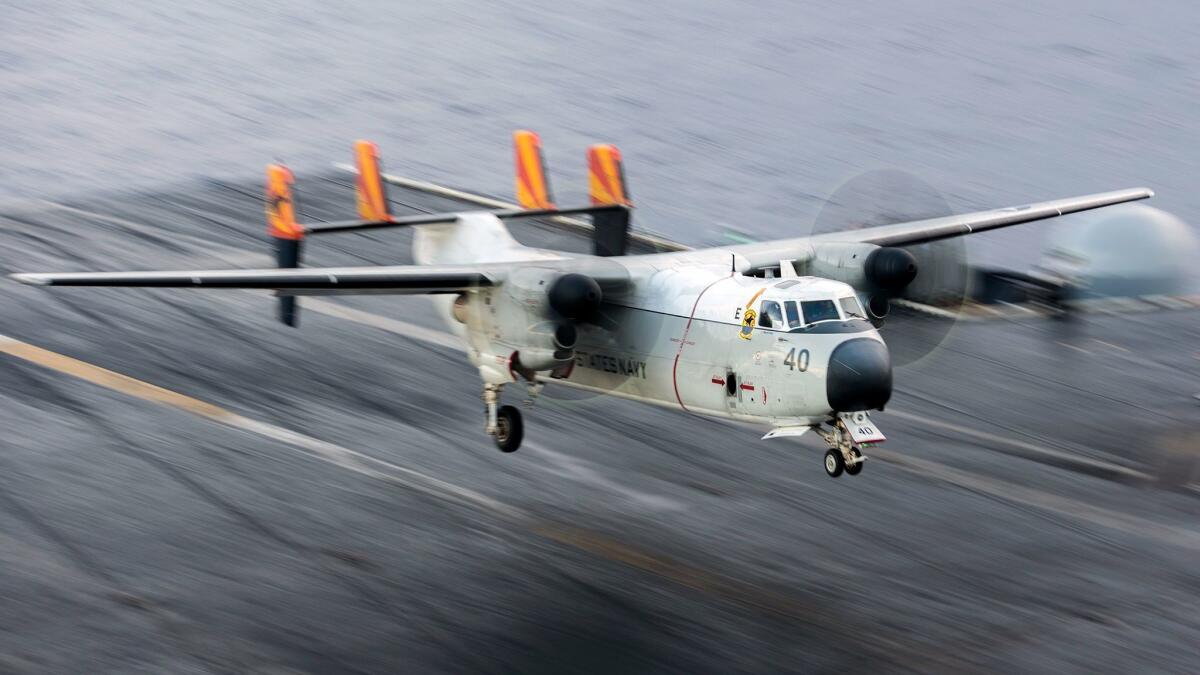 A C-2A Greyhound lands on the aircraft carrier Harry S. Truman in September 2015.