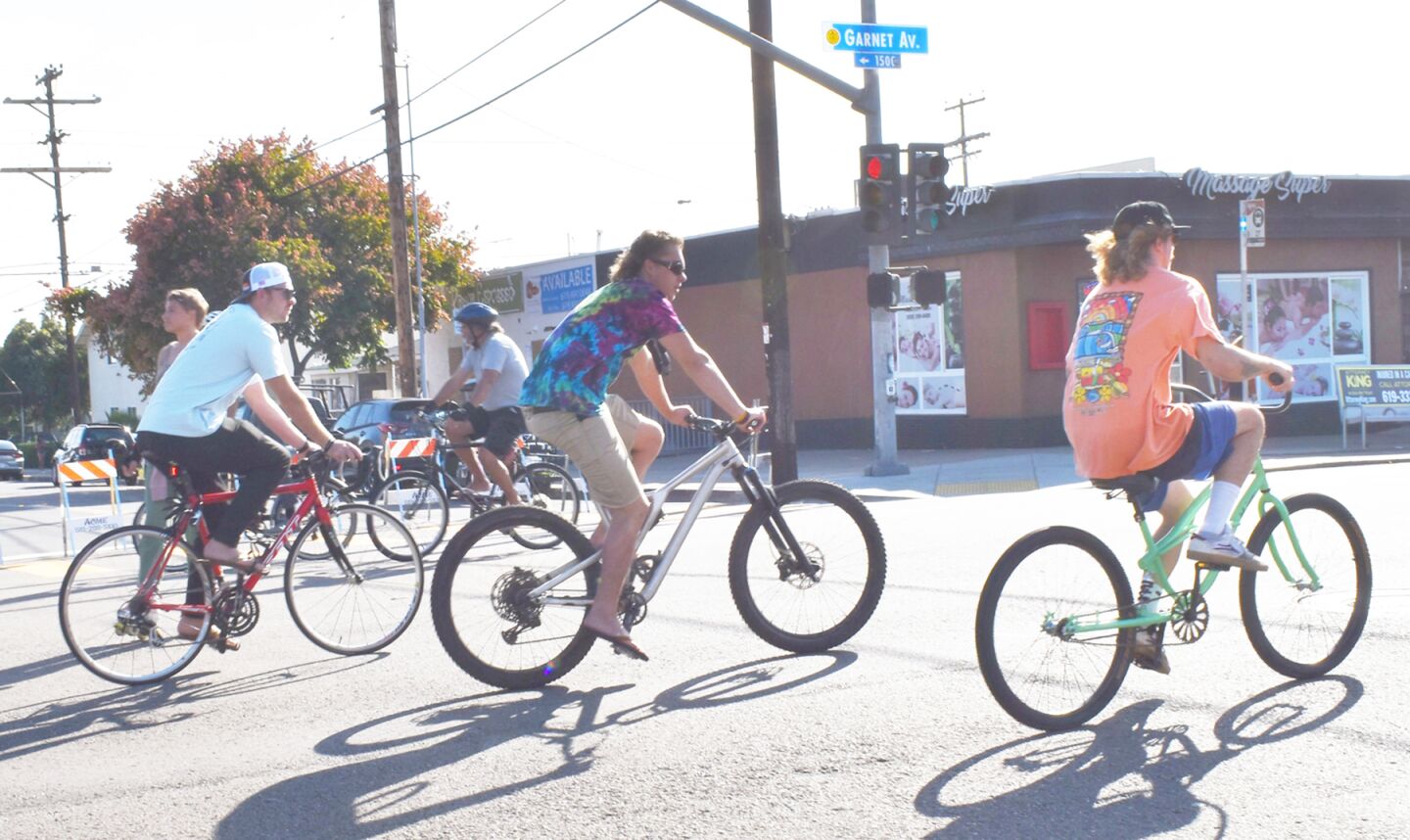 Bicyclists traveling along Garnet Avenue.