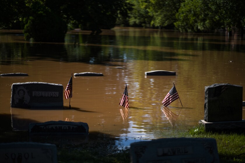 Headstones at a cemetery that flooded 