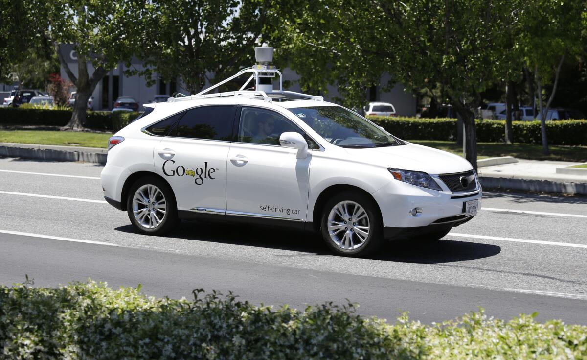 Google says reports that one of its self-driving cars and a Delphi self-driving car had a close call were untrue.