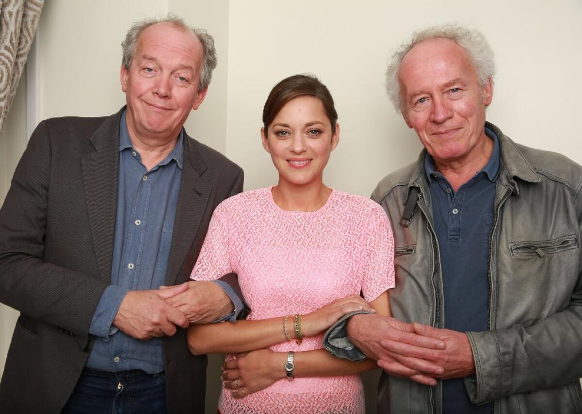 Director Luc Dardenne, actress Marion Cotillard and director Jean-Pierre Dardenne collaborated on "Two Days, One Night," Belgium's entry for the foreign language film Oscar.