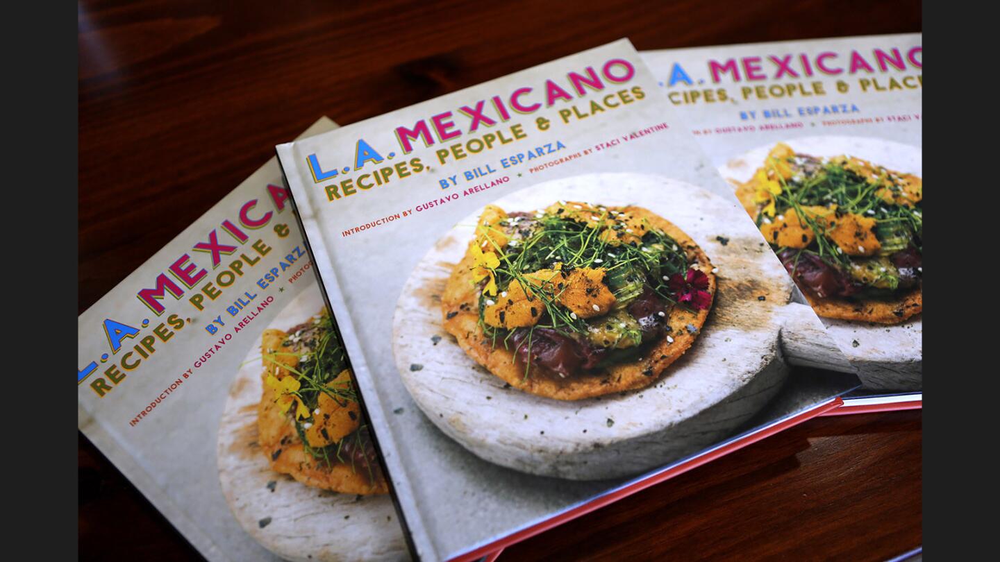 Photo Gallery: Local teacher Bill Esparza signs his new book, L.A. Mexicano, Recipes, People and Places, at Friends and Family Restaurant in L.A.